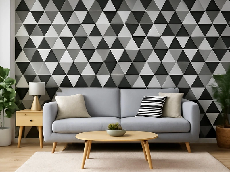 Pola segitiga hitam putih besar di dinding ruang tamu